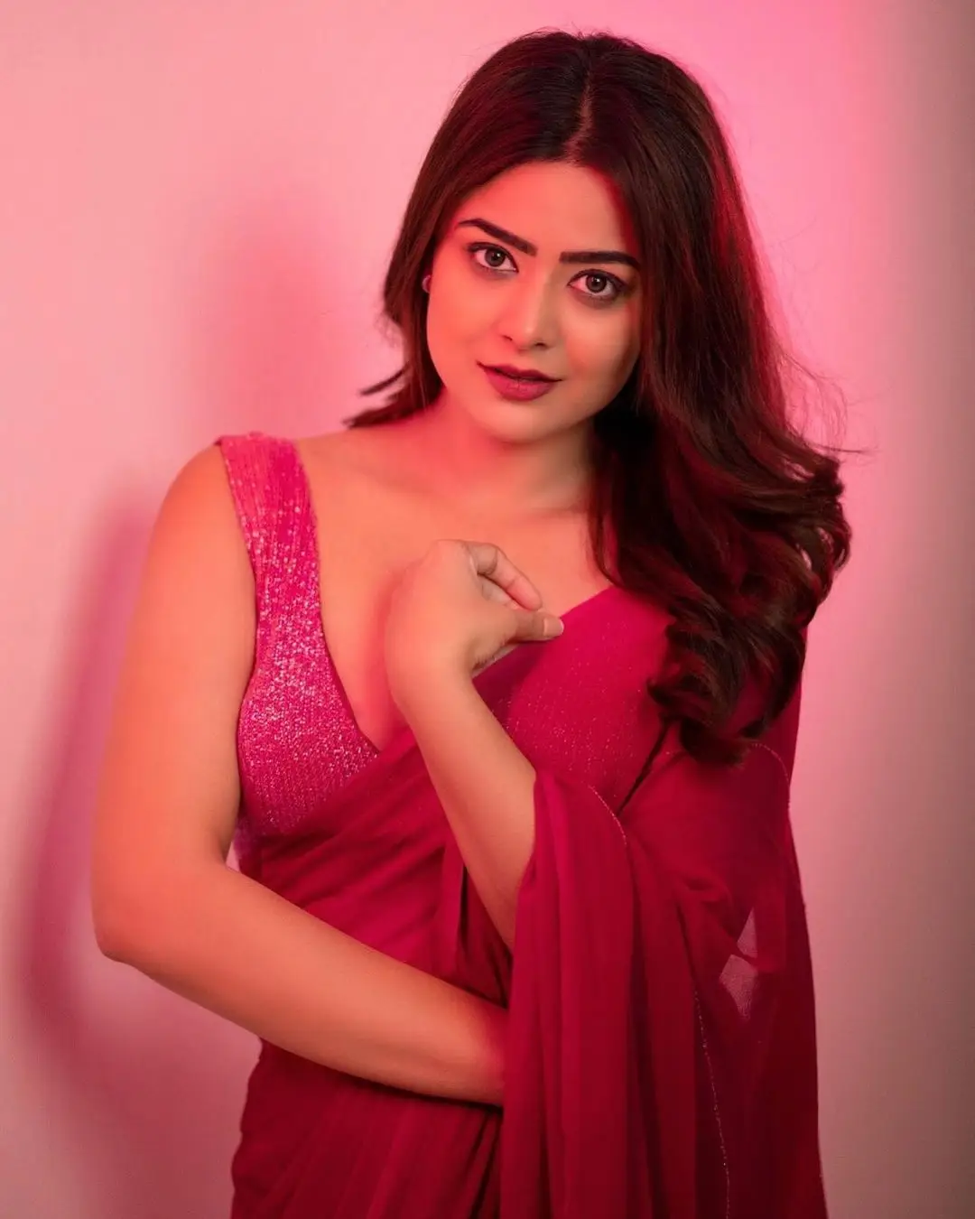 Priyanka Sharma Stills In Pink Saree Sleeveless Blouse